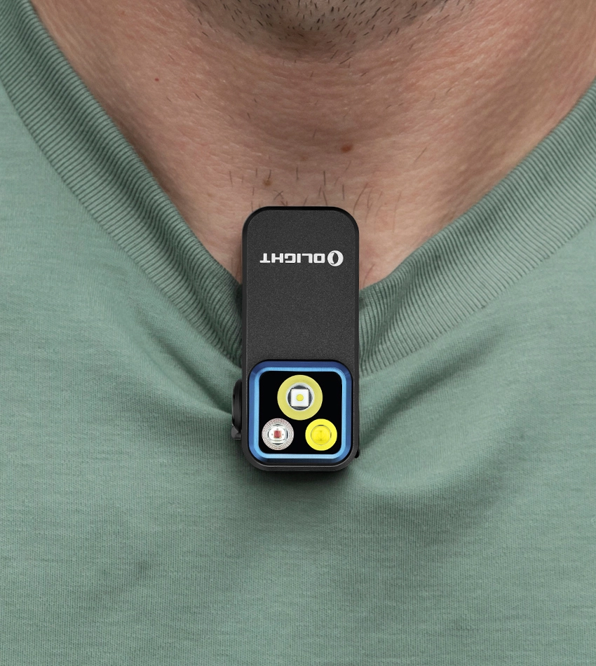 Olight compact clip-on LED flashlight for hands-free lighting, attached to a t-shirt collar for EDC, outdoor activities, and safety.
