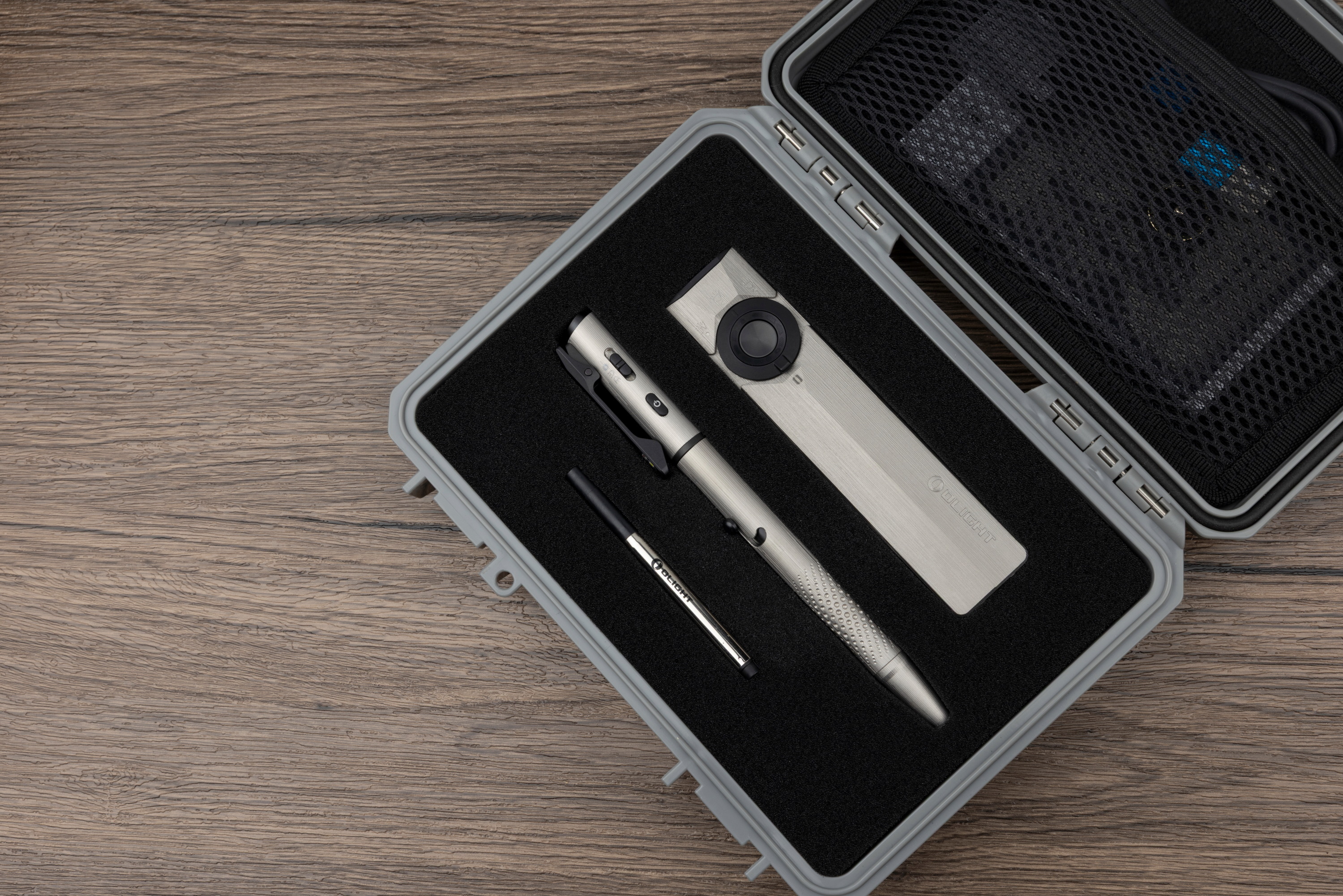 ArkPro Ultra Titanium etched linear pattern and O'Pen 3 Titanium meteor grip texture side by side