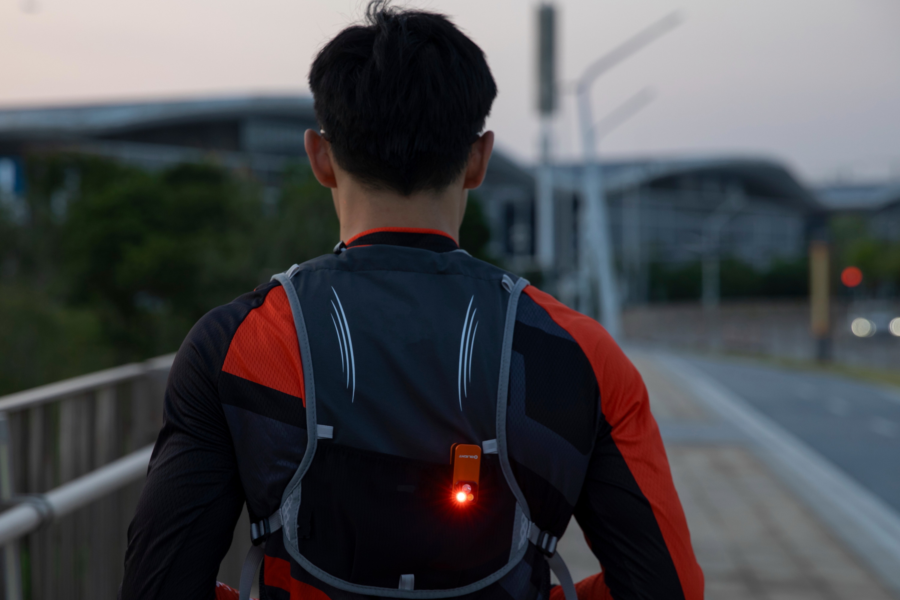 Oclip Pro attached to running clothing vest