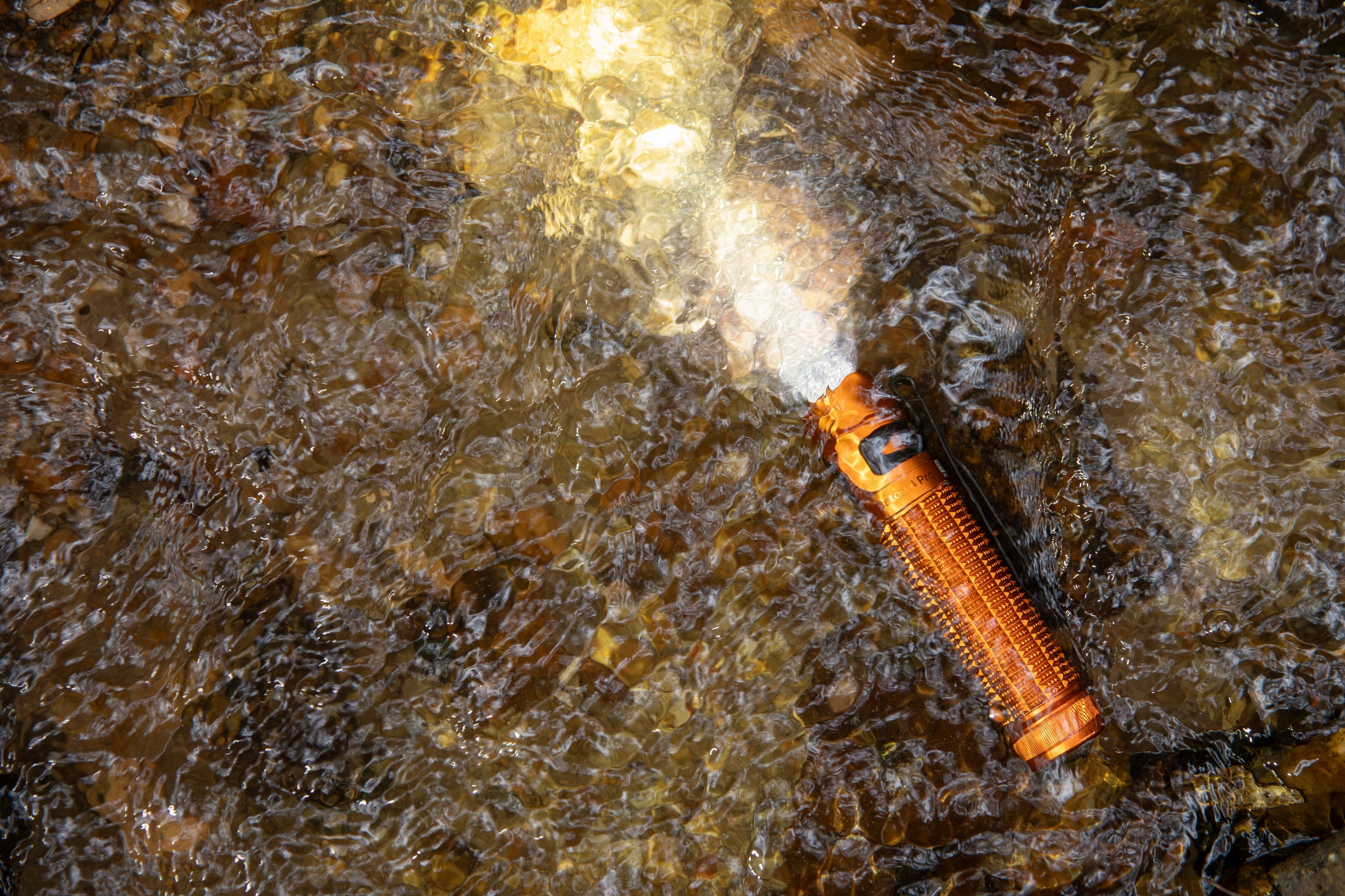 Wasserdichte orangefarbene Taschenlampe Olight IPX8-zertifiziert