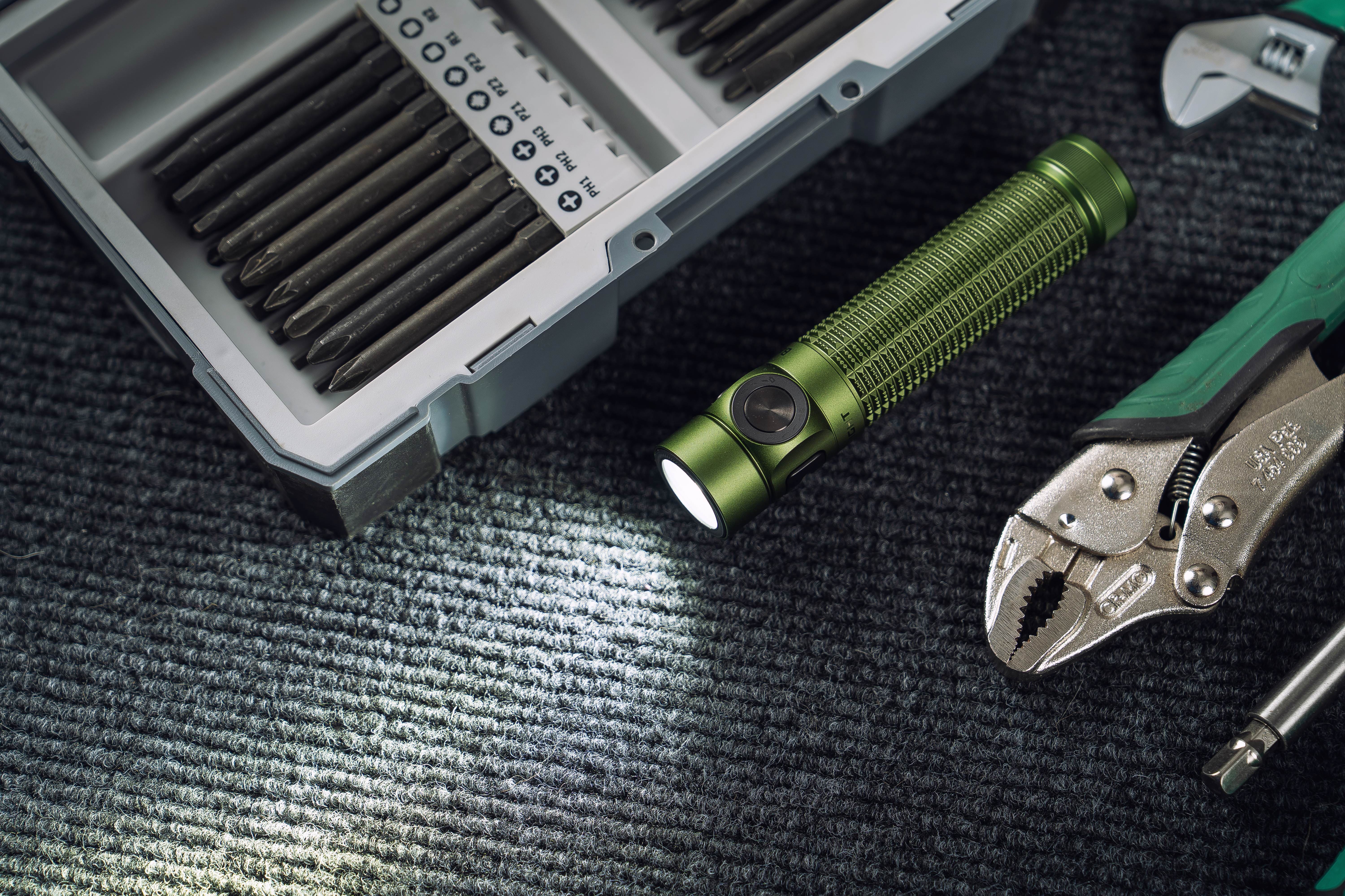 Olight Baton 4 Pro compact tactical flashlight with side and tail switches, 1600 lumens, 200m throw