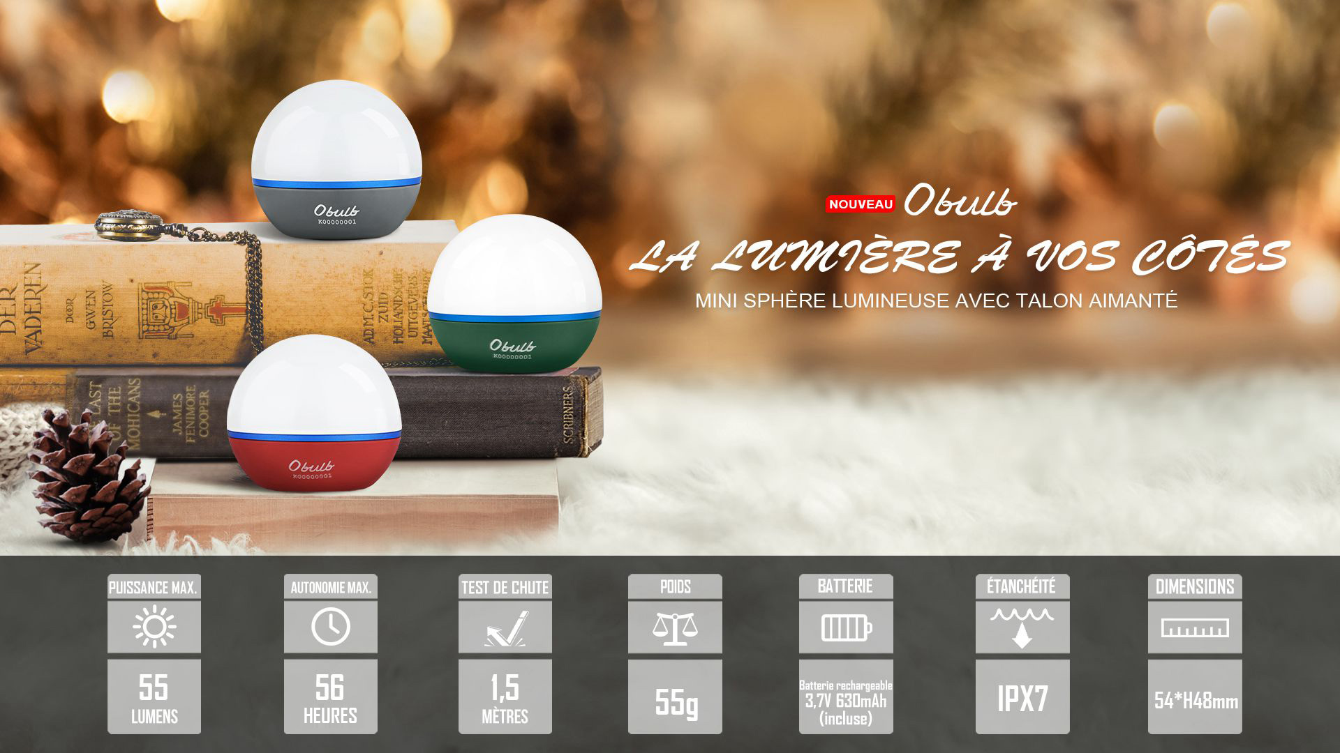 Mini sph&egrave;re lumineuse LED rechargeable Obulb avec talon aimant&eacute; pos&eacute;e sur des livres, lampe veilleuse d'ambiance &eacute;tanche IPX7 de 55 lumens