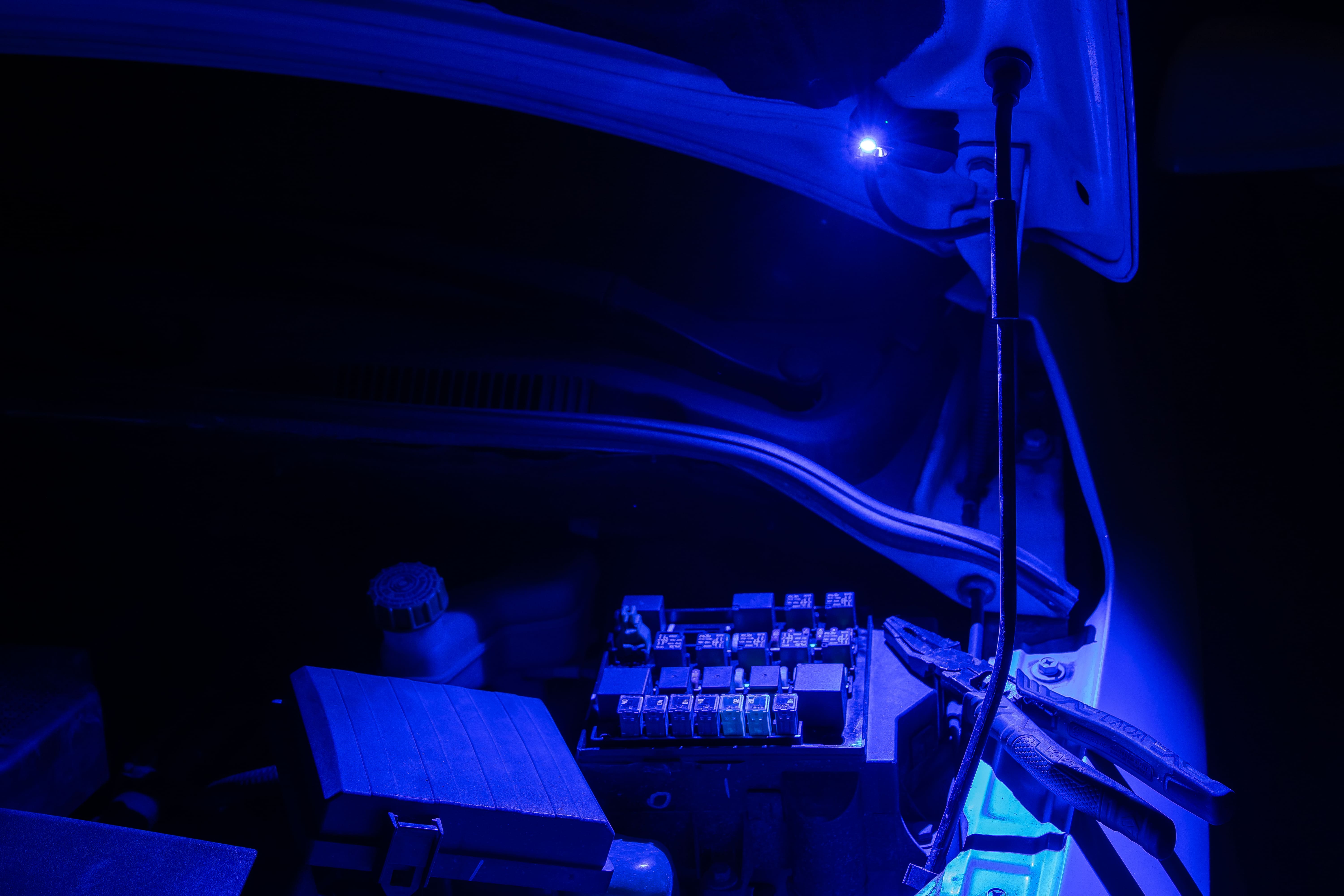 Automotive blue LED engine bay light illuminating tools