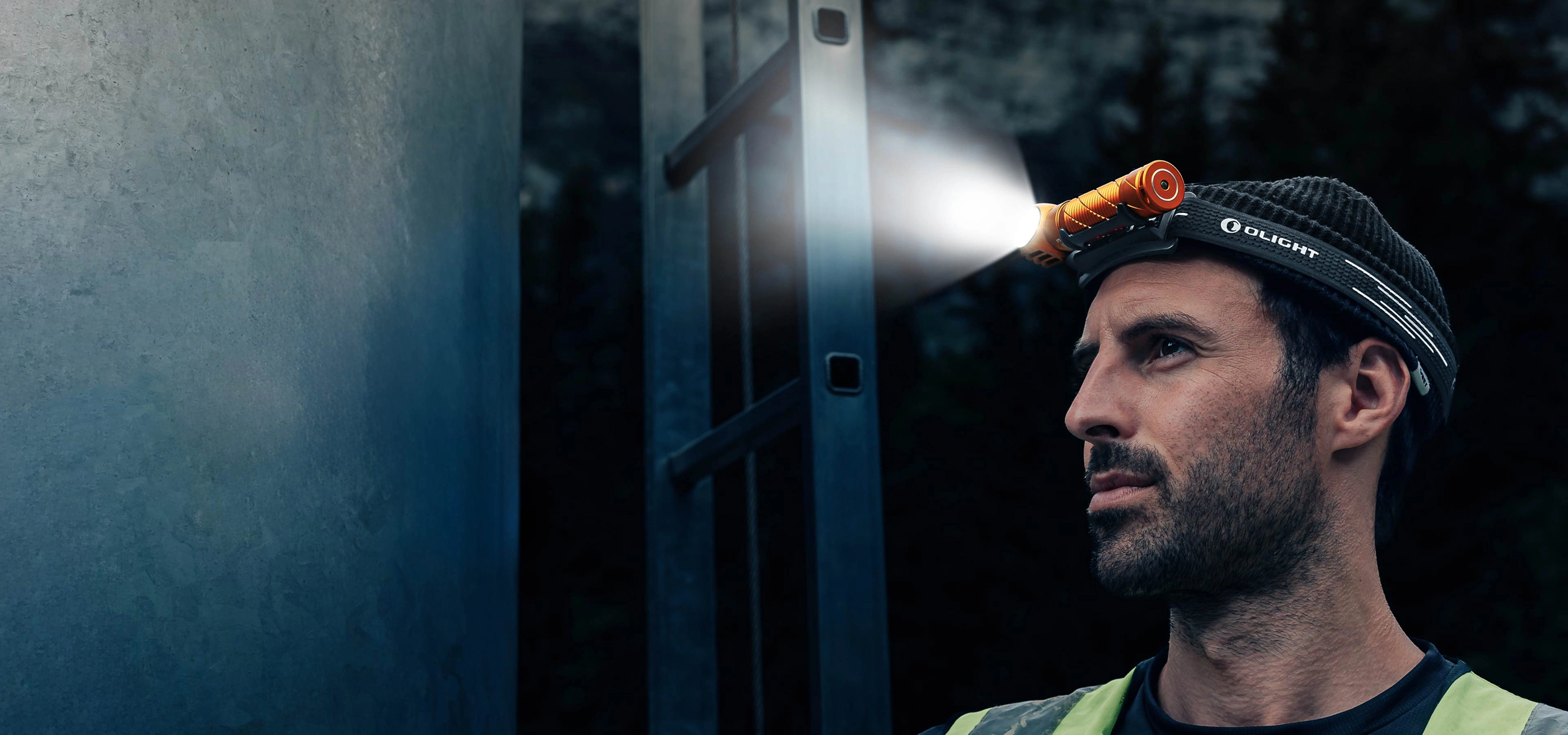 Man Wearing Orange Perun 3 Headlamp