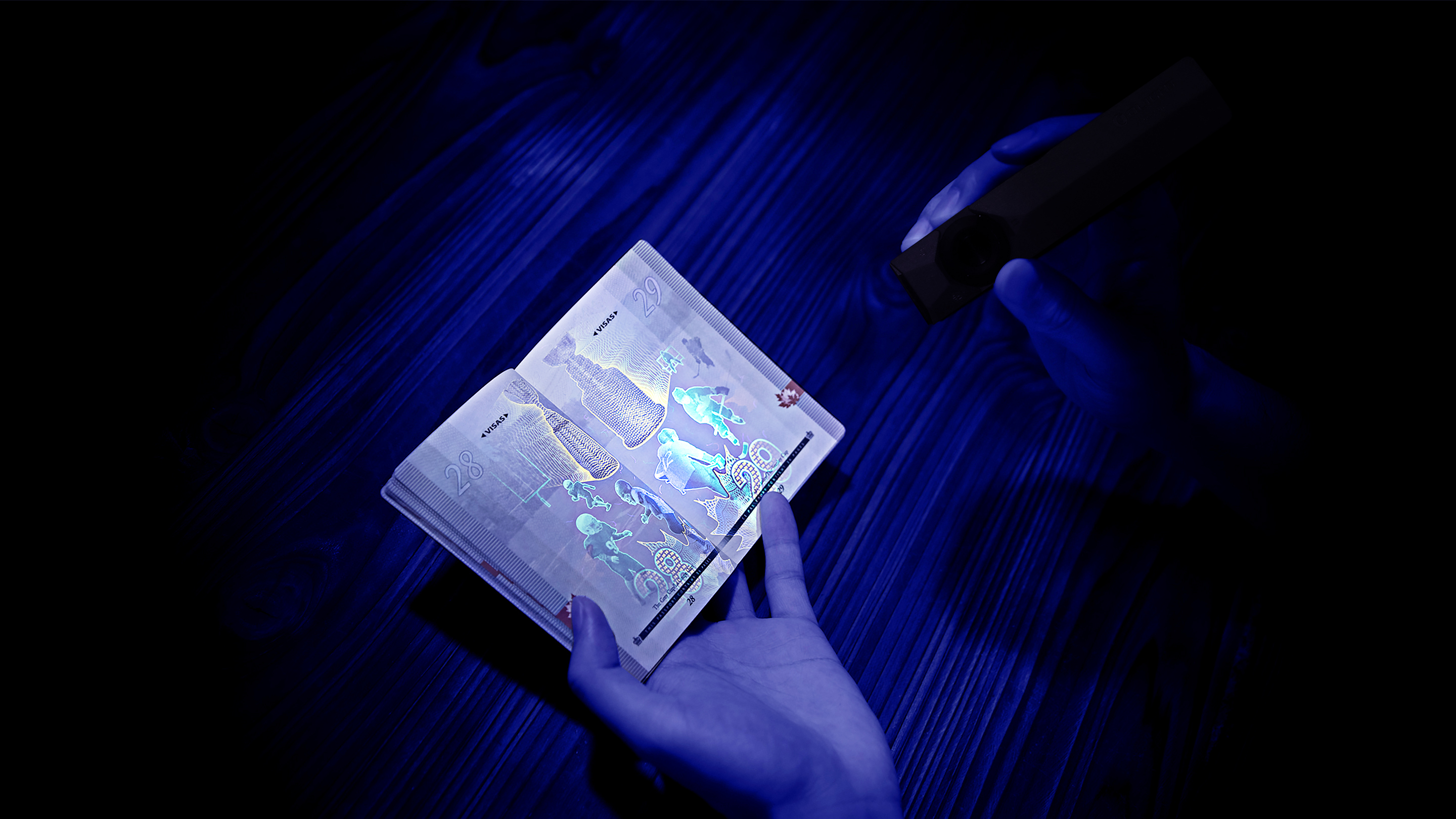 Canadian passport security features revealed under UV light